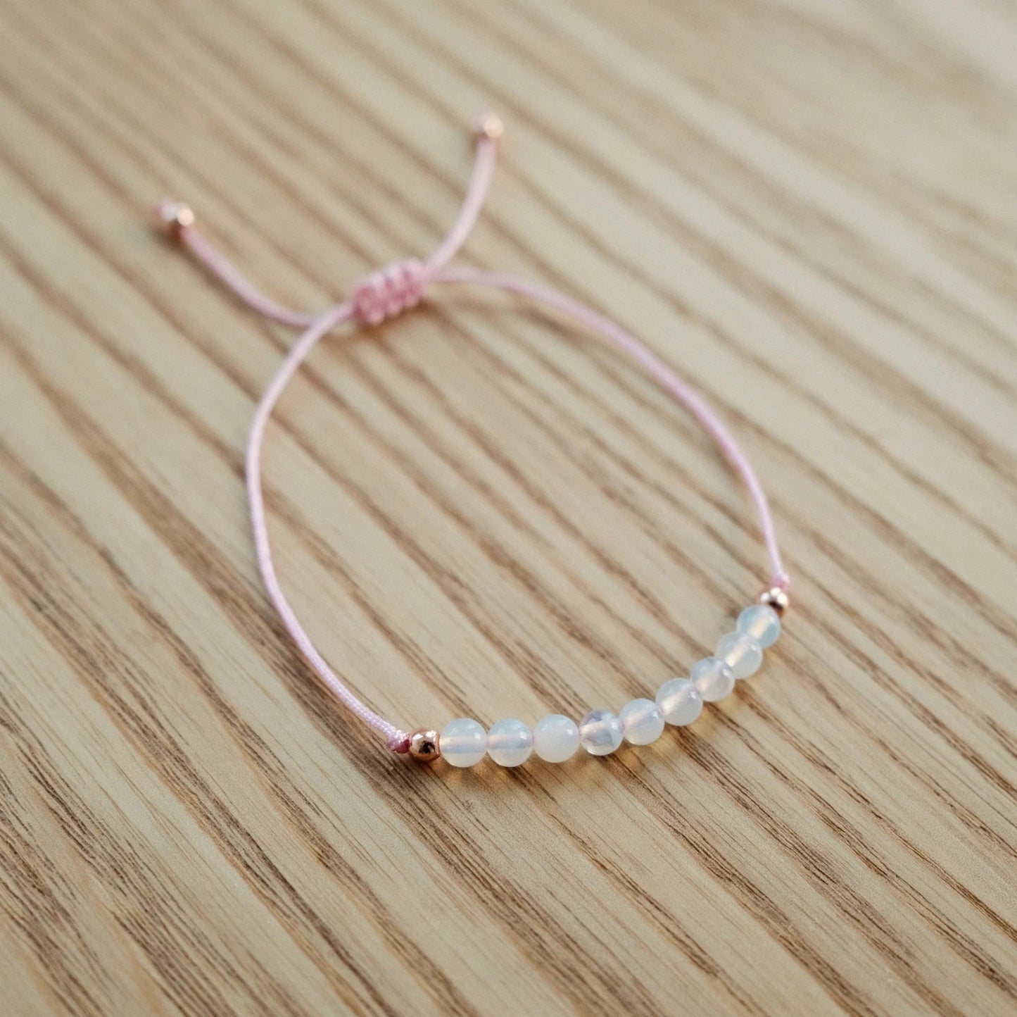 Krystal - Moonstone Crystal and pink cord adjustable bracelet