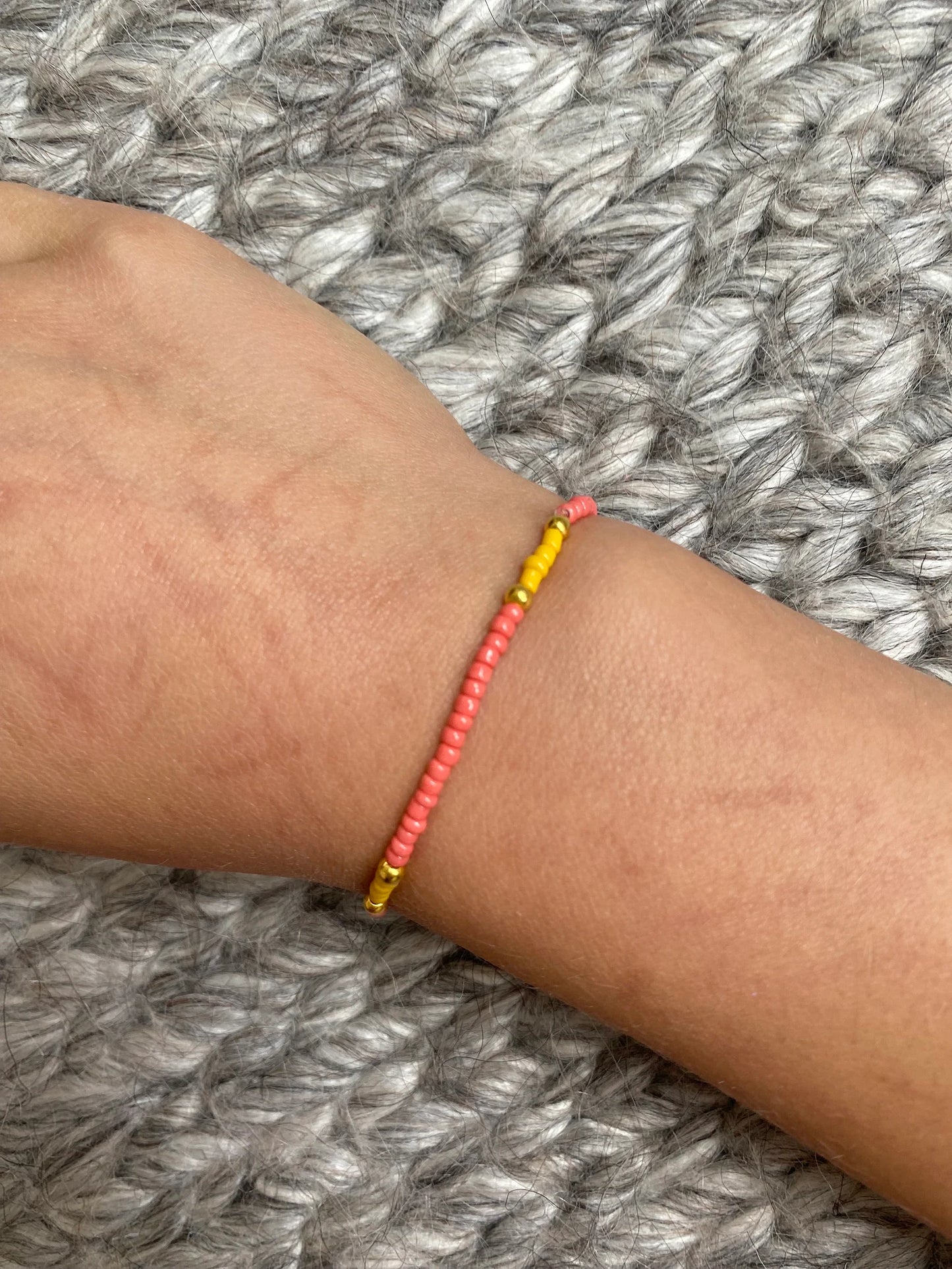 Storm 4 - Seed Bead Bracelet on elastic - Coral, Yellow & Gold