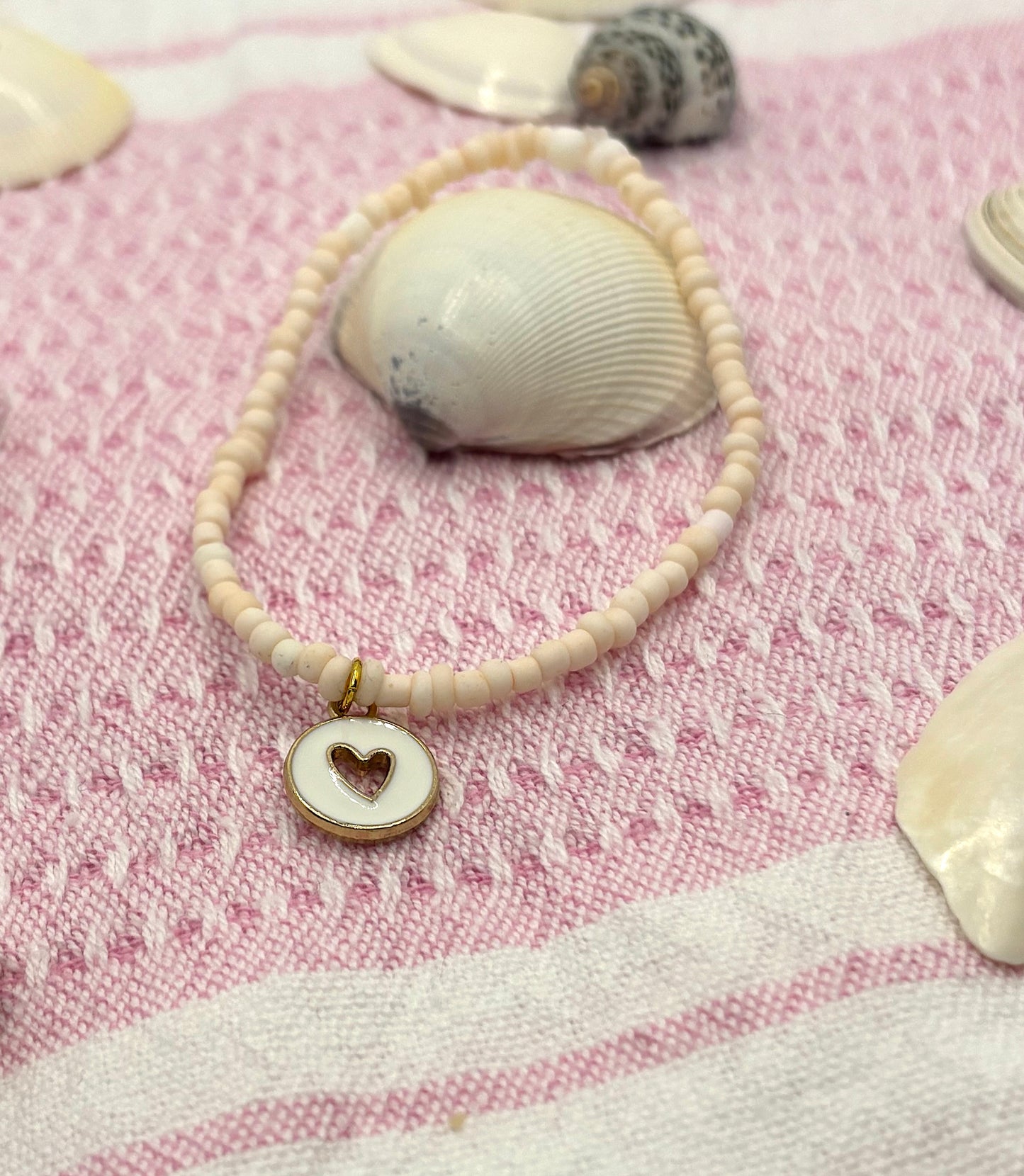 Peach Love - light peach coloured seed beads with a white and gold heart pendant