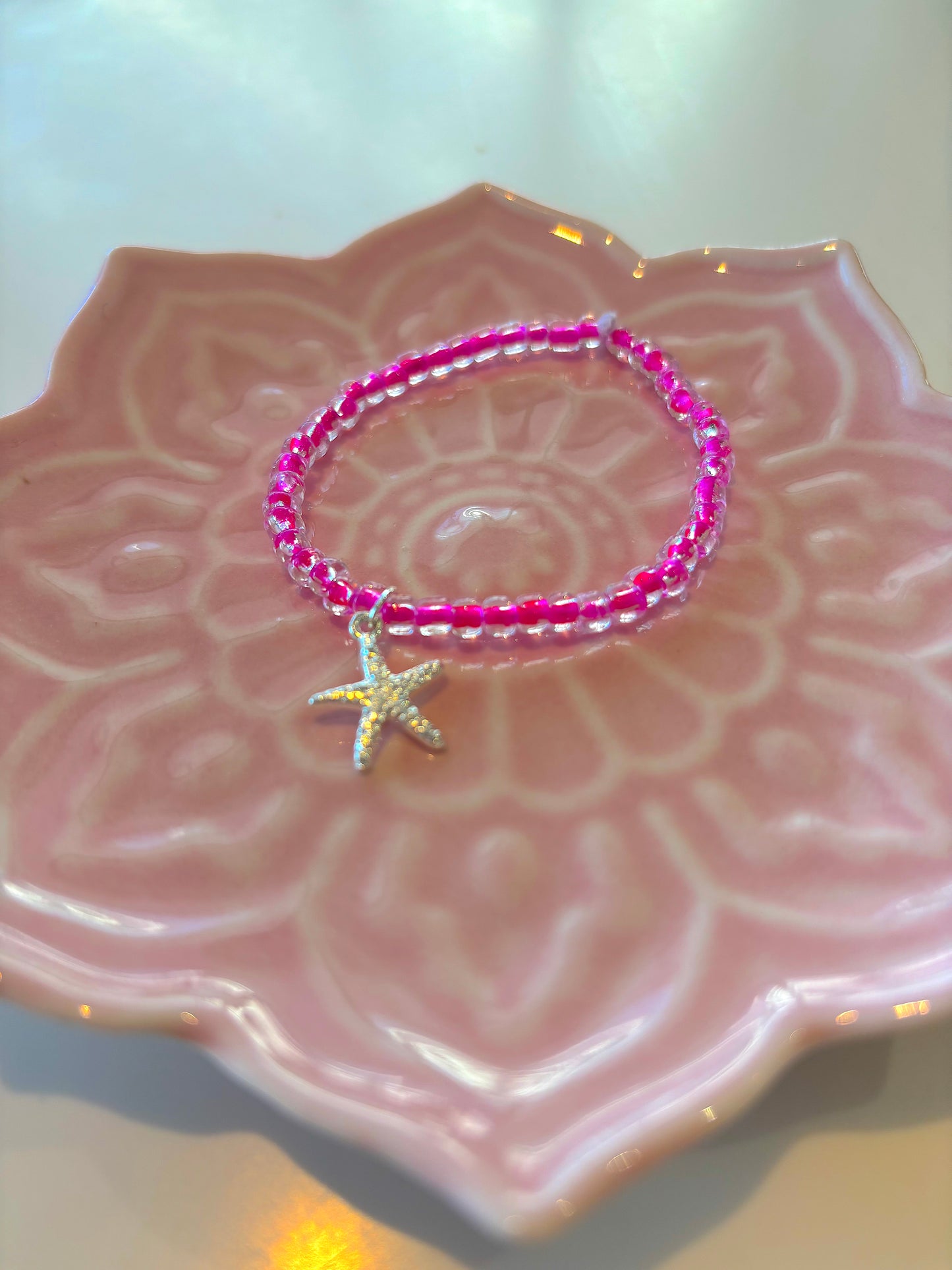 Kindness - Bright Pink beaded bracelet with silver starfish pendant (made by bKind)