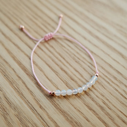 Krystal - Moonstone Crystal and pink cord adjustable bracelet