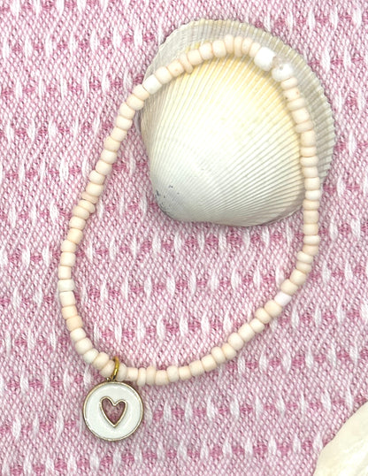 Peach Love - light peach coloured seed beads with a white and gold heart pendant