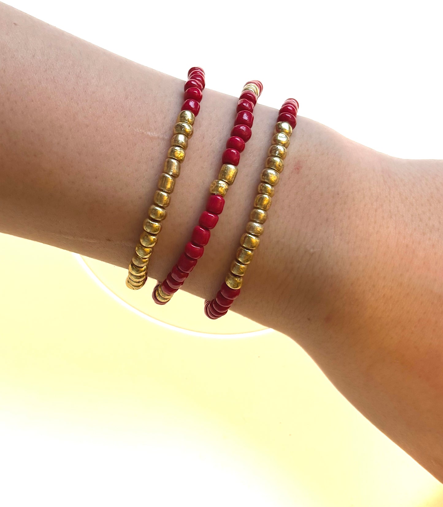 Red Pepper! Set of 3 red and gold seed beaded bracelets.