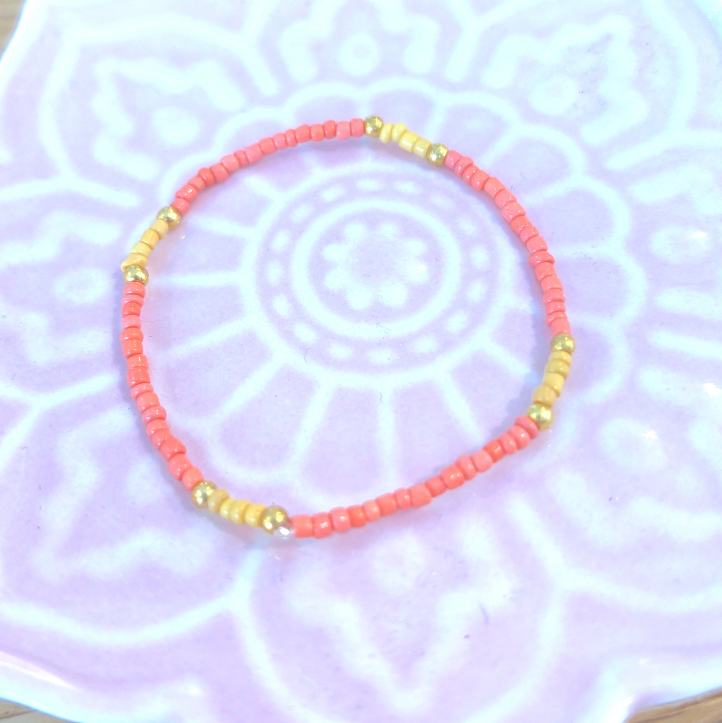 Storm 4 - Seed Bead Bracelet on elastic - Coral, Yellow & Gold