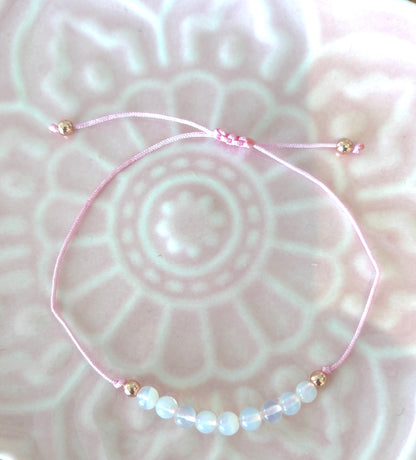 Krystal - Moonstone Crystal and pink cord adjustable bracelet